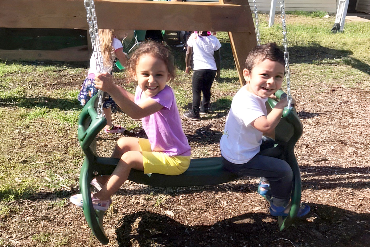 A Large Playground & Basketball Court For Outdoor Adventures